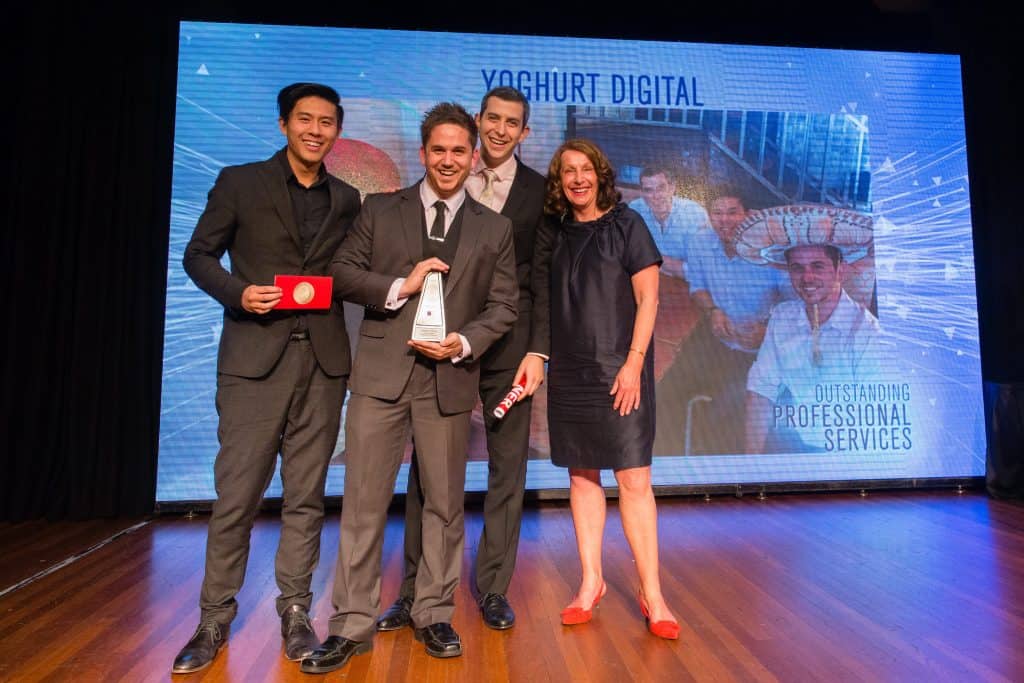 Ian, Matt and Michael receiving their award